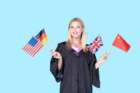 国家考试留学生手拿国旗背景