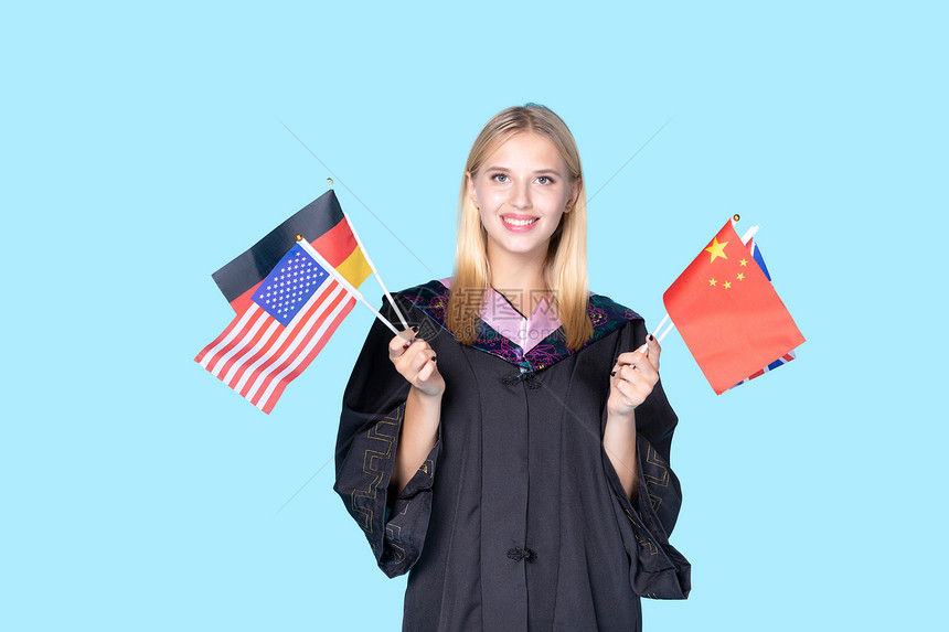 留学生手拿国旗图片