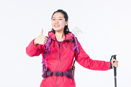 登山标志远足女性举大拇指背景