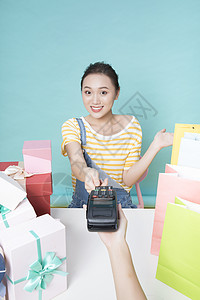 女性购物刷卡背景图片