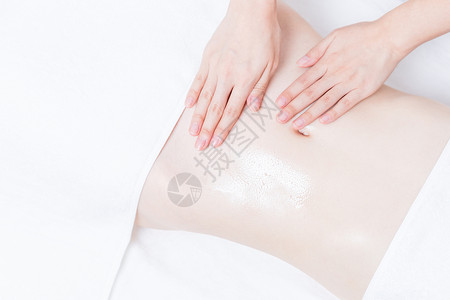 臀部spa女性养生SPA腹部精油按摩背景