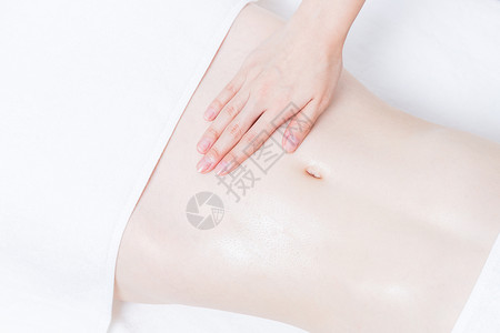 女性养生SPA腹部精油按摩图片素材