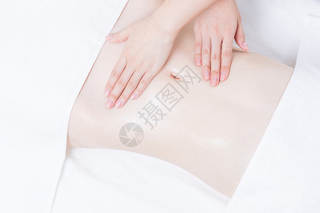 女性养生SPA腹部精油按摩图片素材