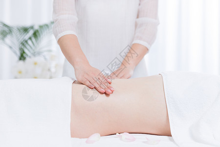 女性养生SPA腹部按摩图片素材