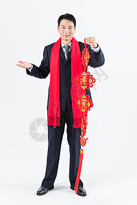 新春商务男性手拿春节挂饰背景图片