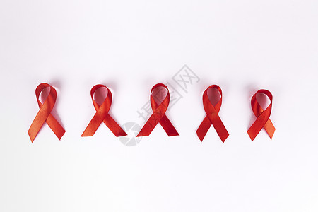 关爱艾滋群体红丝带背景