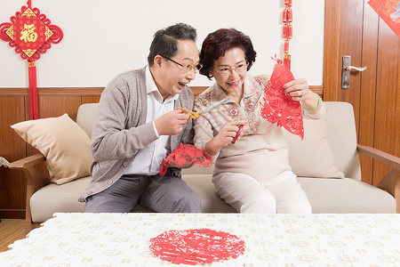 春节金婚老人剪纸背景图片