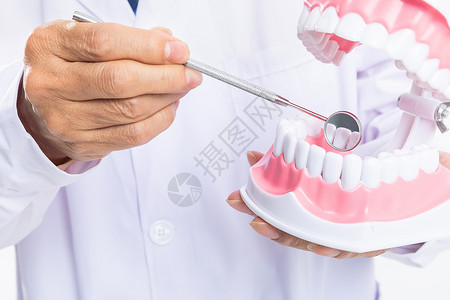 一颗牙牙镜检查牙齿背景