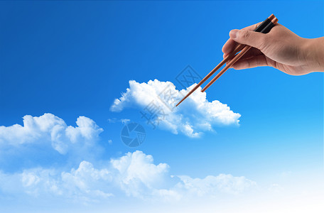 筷子下的云朵背景图片