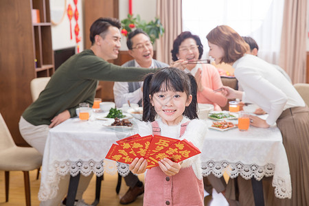 春节一家快乐小女孩收新年红包背景