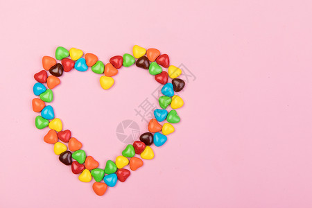 浪漫色爱心情人节心形糖果巧克力背景
