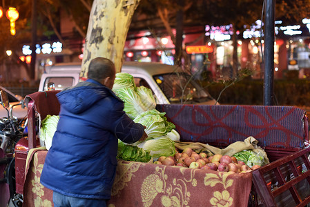 小贩在卖水果小贩背景