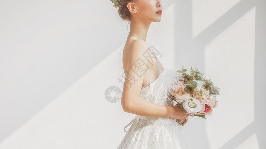 新娘美妆婚纱美女拿着捧花背景