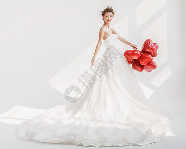 气球造型婚纱美女手持气球背景
