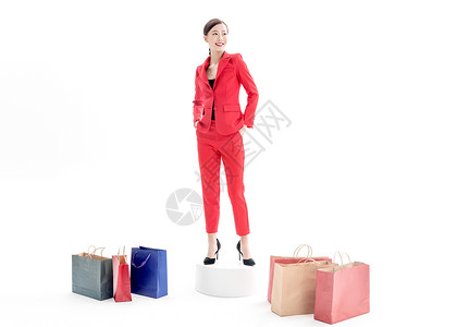 红色西装女性购物背景图片