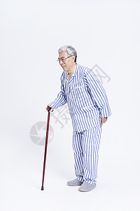 老年病人拐杖背景图片