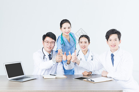 职业女性点赞医疗会议医生们举大拇指背景