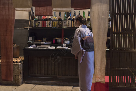 日料店会员卡日本料理店的和服侍女背景