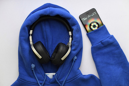 数码电子产品播放音乐的运动蓝牙耳机背景