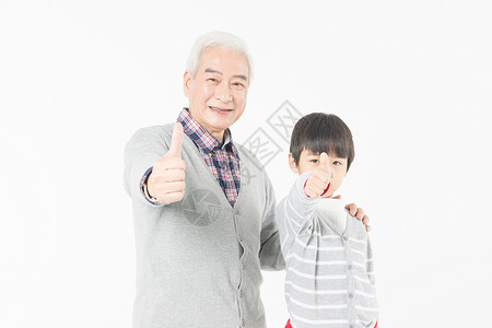 祖孙情爷爷和孙子举大拇指背景图片
