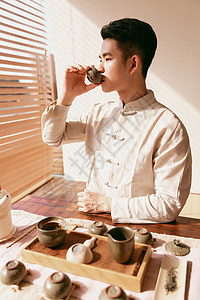 男茶艺师喝茶背景图片