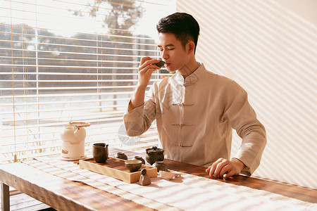 中国风帅哥版男茶艺师喝茶背景