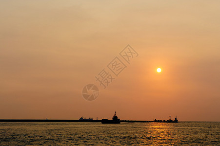 台湾高雄海港夕阳西下背景图片