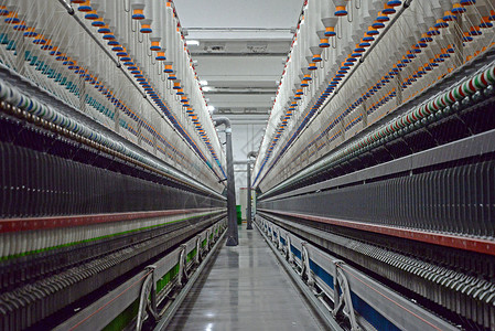 现代纺织厂纺纱机纺织车间高清图片素材