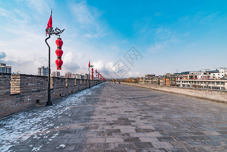 西安城墙雪景背景图片