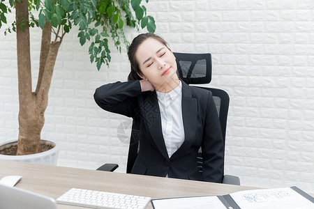 商务女性肩颈酸痛高清图片