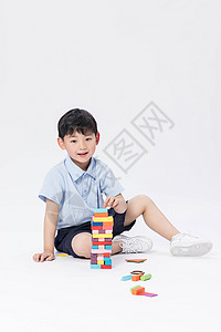玩积木的小男孩 背景图片