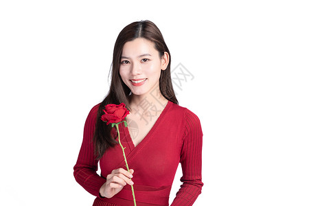 女性手持玫瑰花图片