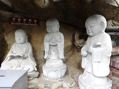 韩国釜山的小和尚石雕背景