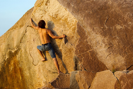攀登励志户外攀岩的男人背影背景