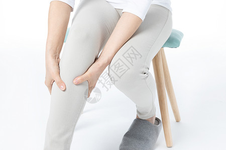 女性膝盖疼背景图片