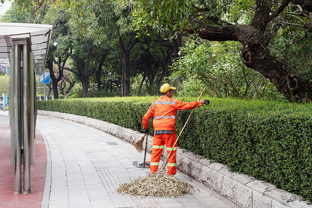 辛勤扫地城市环卫工人背景