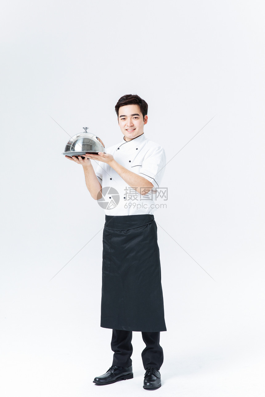 厨师拿着西餐托盘图片