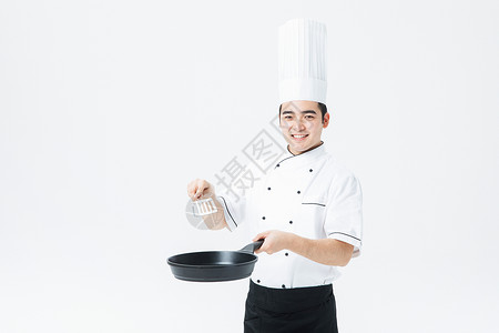 男厨师拿锅厨师拿着锅背景