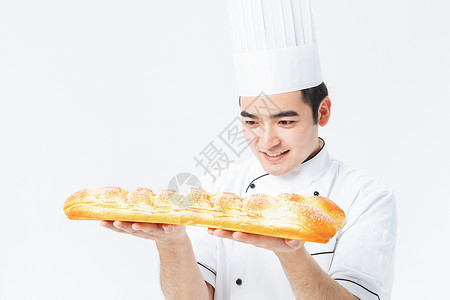 厨师拿着面包背景图片