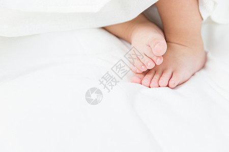 孩子的脚婴儿脚特写背景