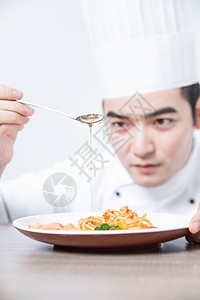西餐厨师食物调味背景图片