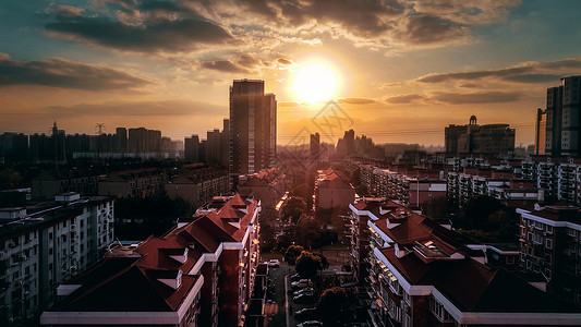 上海小区建筑日落背景图片