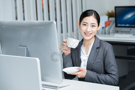商务女性喝咖啡图片