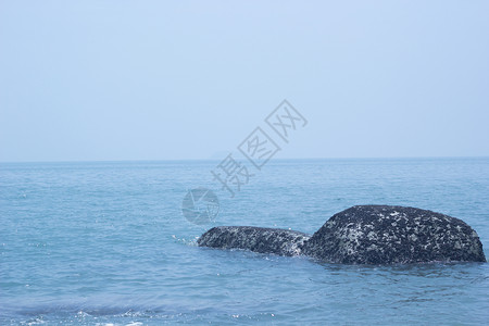 蓝色大海海报厦门黄厝海滩礁石背景