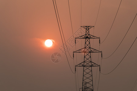 夕阳下的电线杆电塔高清图片素材