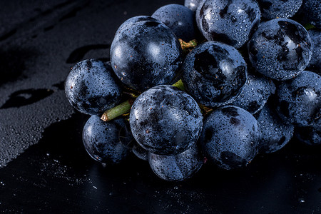 黑底水果素材黑底紫葡萄背景