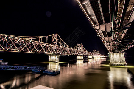 钢索丹东鸭绿江大桥夜景背景