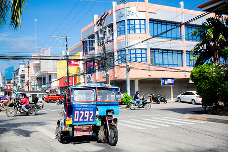 菲律宾街道的蹦蹦车背景图片