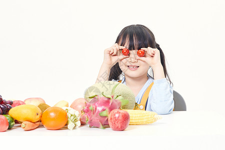 小女孩与水果图片