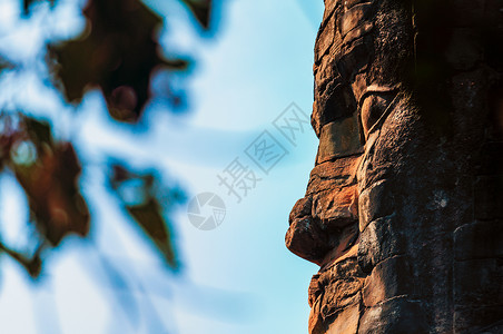 柬埔寨吴哥窟石头佛像背景图片